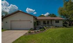 Ozona Shores at its Finest! Waterfront and golf cart community. 3 bedroom, 2 bath, 2 car garage home with deep park like setting lot located on conservation and pond. Adorable front porch, front door opens into the combination great room and dining room