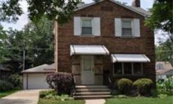 Stately Baltis built brick Georgian style home with neutral decor, hardwood floors and newer windows.Formal dining room & updated eat in kitchen. Two bedrooms & one bath on upper level. Full basement.Home has newer furnace,central air conditioner & hot