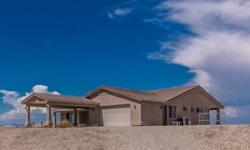 Beautiful Havasu heights home on 2.16 acres. Bring your horses, motor home, boats, and desert toys, plenty of wide open space for everything. The home has a great floor plan, 1888 sq. ft of open living dining concept, lovely focal point fireplace and a