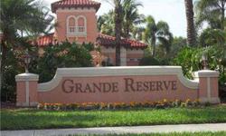 This immaculate 1st floor Grande Reserve coach home features two bedrooms and a den, 2 car garage and a lanai overlooking the 4th fairway of the Gordon G. Lewis 27-hole championship golf course. Enjoy the Florida lifestyle the Strand has to offer with