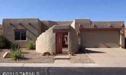 Gorgeous Canada Hills home in the heart of Oro Valley! This large single level home greets you with a charming courtyard and full glass entry door. The home features extensive 18 floor tile, granite counters, a fireplace, and 4 bedrooms. The master suite