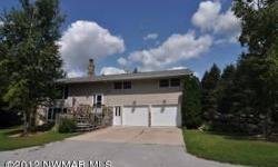 80 ACRE HOBBY FARM! Great 3 bedroom home that is nicely landscaped with a 2 car garage and machine shed. House has had many recent updates. Home has a beautiful rock fireplace in the large family room, heating and cooling is supplied by the in ground heat