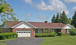 This beautiful brick home sits on a very large lot in the Chapel Hills Subdivision of Millcreek Township. All rooms are spacious. A third garage is side-entry and leads to a finished basement that could be converted to an in-law apartment. The views are
