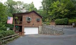 Very well kept home nestled in a tree house setting in Maggie Valley Country Club. Take your golf cart to the course. Basement was expanded to be a large game room with pool table, wet bar & fireplace. 2 decks to enjoy the cool mountain breezes. Lots of