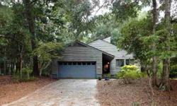 Great location near beach, parks, and country club. Large lot, almost 1/2 acre, with lots of hardwood trees and privacy. The house is in very good condition and has lots of character with a loft area and a fireplace.Listing originally posted at http