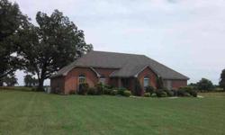 Immaculate brick home on 5 manicured acres, 3 large bedrooms, 2 & 1/2 baths, jaccuzzi tub in master suite bathroom, central heat/air with heat pump, large living room with wood burning fire place, large eat-in kitchen, separate dining room, carpet and