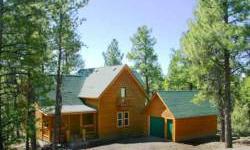 Charming mountain home in the woods. Covered front porch welcomes you to the furnished open floor plan featuring vaulted t-in-g ceilings, woodfloors, large windows, wood burning stove with river rock surround, living room, dedicated dining area area,