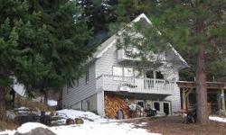 SPACIOUS AND AFFORDABLE 1950 sq ft, 3 bedroom chalet tucked away in wonderful Whispering Pines, located a mere 5 minutes from the south entrance to beautiful Lake Wenatchee. Updated kitchen and bath, newer carpet, paint and sundeck. Full daylight basement