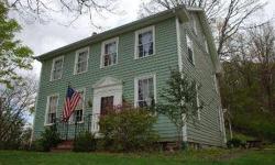 Circa 1870 colonial sited high on the hill on a wood lot with exceptional views over looking the Boro of Milford and the Delaware River. Perfect get away retreat or for a home owner who desires an in town property. Enter into a large foyer (gathering