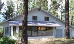 A great family retreat in the woods yet minutes from Downtown Pagosa Springs. Master on the main level, a large sun-room perfect for plants or a home office. Kitchen has a view, separate dining area just off the living room. Lots of windows in this home