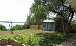 Lake View Home in Belton, near Temple Lake Park. The million dollar, panoramic lake view is absolutely amazing!! This updated two bedroom, two bathhome is the home that you have been waiting for! Enjoy your lake view from almost every room in the house.