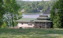 SMITH LAKE- WONDERFUL LIKE NEW 4 BR,4 BA LAKE HOME. GREAT PLACE ON LAKE WITHIN 12 MINUTES OF I-65. ONE OF THE FEW PLACES WITH THIS MUCH ACREAGE ON GOOD WATER UNDER 250K.HAS NICE DECK ON LAKESIDE AND BOAT DOCK.LANDSCAPED YARD. HAS ROAD TO WATER. PLEASE