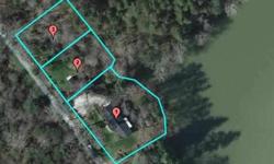 1.31 Acre wooded retreat with over 150' on Gunpowder Creek Lake. This is the perfect place for your kids to explore nature. Tucked away at the end of the street, this private three bedroom home offers a large great room with cathedral ceiling and soaring