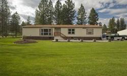 With one of the best horse setups available in this price range, a Home that is well maintained and offers a spacious kitchen w/ island and a large enclosed porch. Barn #1 is 40x60, heated and insulated, setup with hot and cold water, and 7 stalls. Barn