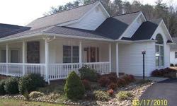 Amazing 3 bedroom, 3 bath basement rancher, hardwood floors, low maintenance exterior, open floor plan, with all city utilities located in nice neighborhood in the heart of Pigeon Forge. Gas log fireplace in the Living Room, open kitchen with lots of
