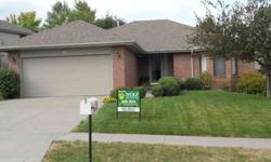 Lovely brick Truax Built Patio Home located in Lincoln's Aspen Subdivision. Spacious living room with 10ft ceiling, fireplace & tall windows make this home quite inviting. Rich look of oak floors & cabinets, including a built-in hutch in dining room with