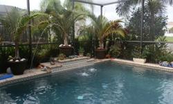 Beautiful house, located in highly desirable gated community of Mira Lago in Ruskin, Florida. It is a wonderful 4 bedroom, 2 bath, 3 car garage, single story, split floor plan home with a large salt water in-ground pool with two built in fountains and an