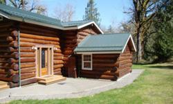 Welcome to Hanstad Creek Lodge nestled in the trees near the creek offering the ideal country retreat. This quality built log home features all the comforts of modern housing with the peace, quiet & seclusion of the country.An open floor plan provides the