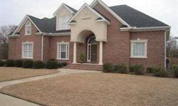 'Exquisite brick home in the exclusive Parrish Plantation subdivision. You will love this quality CUSTOM built 4 bedroom and 3.5 bath home with hardwoods, ceramic tile, gas logs, heavy crown molding, high ceilings, solid core doors, granite countertops in