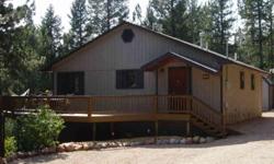 Beautiful raised ranch bordering Pike National Forest. Home has been completely remodeled in the past six years. End of road cul-de-sac location secluded and private. Huge wrap around deck. Almost everything in this amazing home has been replaced or