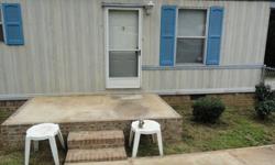 2 Bedroom 1 Bath Mobile Home With .86ac of Land. Brick Underpinning In District 3 Cowpens. It Has The Stove,Microwave,Washer,and Dryer. Fenced In Front Yard. A Carport Also Two Buildings One Of Them With Power Already Hooked Up.. PUBLIC WATER, PUBLIC