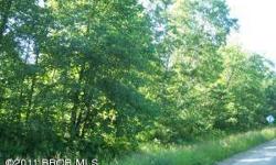 Just minutes from town, this beautiful 5 Ac wooded lot is perfect for your new dream home.Listing originally posted at http