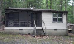 NO KEY YET SORRY ! Handyman Special. This home is being sold as is. It could be returned to it's adorable self with a some help from your contractor. Originally one bedroom, but half the porch was enclosed at some time to make a second bedroom. Wood