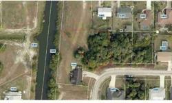 Nearly one half acre centrally located off Price Blvd. Directly abuts county easement which enhances your privacy. Bring your plans, bring your offers. Don't miss a great opportunity for a large sized lot in North Port!