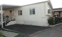 LILY PIGG & MOBILE HOME CONNECTION PRESENT.Very Charming home downtown Santee. Walk to post office, Kohls, Sprouts, Starbucks and more. The home is lite & bright and has been kept immaculate. White interior with beautiful accents. Large bedrooms, inviting