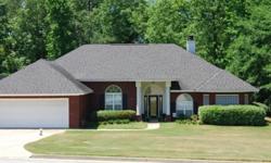 This 4 BR, 2 BA, 2,257sq ft home sits on a half-acre with a wonderful view of Holland Creek. The home has a split floor plan, large family room, and formal dining room. The spacious family room has vaulted ceilings, a marble fireplace and gas logs. The