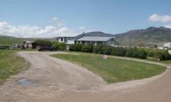 Great home out in the country between Lava and McCammon on 14 more or less fence in acres with 2 hay barns, 2 sheds, Chicken coup, large garden area and nice yard. Great for horses and small farm set up. Home features a large master bedroom with a walk in