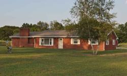3 bedroom 2 bath brick ranch with approximately 1936 sq. feet. Home features large family room w/fireplace, spacious kitchen w/oak cabinets, located on 25 acres with approximately 17 acres cropland. Enjoy the outdoors with the large stocked pond, detached