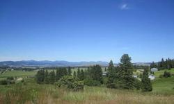 Popular South Linke/Saddle Ridge Area. Gated Community. Hard to find 11 acre parcel so cose in to Spokane Valley. Great territorial views and City lightviews also. Easy all paved access in area of beautiful homes.Listing originally posted at http