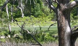This lovely estate lot offers wonderful marsh to golf course views. At almost an acre & situated at the end of a cul-de-sac, this property offers quiet & privacy. The property was recently cleared and you'll see that the land is graced with mature oak,