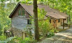 The quintessential mountain home close to Brevard, Asheville Regional Airport, and Hendersonville. This cozy rustic retreat boasts a large renovated kitchen and two stone fireplaces. Enjoy all the benefits of nature without compromising on the comforts of