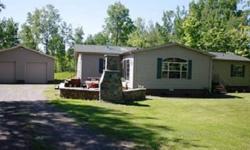 Gorgeous, like new beautifully decorated 3 bedroom, 2 bath home on 2.5 acres. One level living featuring large kitchen with center island, huge pantry, and skylight. Living room with wood burning fireplace, dining room, and bonus great room. Master suite