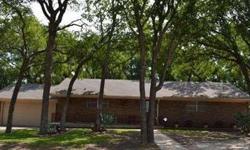Brick 1,597 sq. ft. 3/2/2 home on 10 acres with shady oaks. Living room features a brick WBFP with an adjacent wall of striking cedar. More beautiful cedar also lines the entry to the home. Split bedrooms share a remodeled bath with tile countertops &