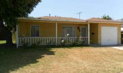 EXCELLENT HOME FOR A FIRST TIME BUYER OR INVESTOR. 2 BEDROOMS, 1 BATH, LARGE FAMILY ROOM WITH FIREPLACE, SPACIOUS PARK LIKE BACK YARD...EXCELLENT FOR ENTERTAINMENT. LOTS OF POSSIBILITIES TO EXPAND THE SQUARE FOOTAGE OF HOME. PICO RIVERA AREA BORDER LINE