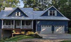 RED HOUSE - Newer home in beautiful country setting. Offering all bedrooms on main floor. Walk-in pantry w/ cabinetry Beautiful kitchen with island open to living room. Hickory floors and knotty pine doors. Energy efficient heating with Hardy Furnace.