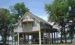 Beautiful waterfront home in Cobb Farm Resort. 2 bedrooms, 3.5 baths, completely furnished, storage room. Great deck areas for entertaining with spectacular views of the Tennessee River. Home also features boat dock.
Listing originally posted at http