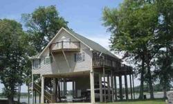 Great waterfront home in Cobb Farm Resort. 2 bedrooms, 3.5 baths, completely furnished, lots of storage. Great deck areas for entertaining with spectacular views of the Tennessee River. Home also offers your own boat dock.Listing originally posted at http