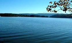 Choice Main Channel Waterfront Lot featuring 169+/- ft. shoreline, .52 acres, fantastic view, protective covenants, curbs & gutters, underground utilities, natural gas, public sewer and water. Prestigious waterfront neighborhood inside Scottsboro city
