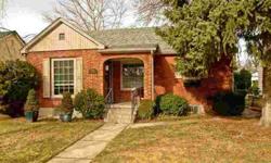 A true joy for the North End lover! Embrace this 1930s brick charmer situated in the ideal location w/quick access to all things that make North End living enjoyable.Original hardwood floors extend throughout main level & complimented by arched doorways &