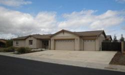 Single level, ranch-style home on half acre, corner lot in desirable Almond Ranch Estates neighborhood. Tile floors in Kitchen, Dining/Family & Baths. Kitchen features upgraded appliance package. Prewired Home Theater & interior/exterior Sound System.