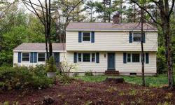 Warm and Inviting Colonial, privately set at this wooded level country location. Loads of space for all your needs including a full finished walk-out basement, just move in and enjoy. Gather the gang in the Kitchen with center island, and adjoining formal