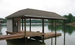 Level waterfront lot with new covered boathouse and floater w/cabana. 1.39 acres and 100' of WF. Letter for 3 bedroom pumpback septic permit. Price reduced $40,000.00.Listing originally posted at http