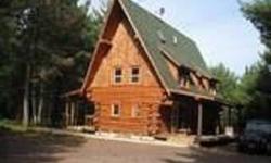 New authentic Scandinavian hand built log home. Hand crafted with care and excellence this home is situated on a 2.77 acre lot, and just a short 100 yards down one of the property paths, a view of the Eau Claire River which joins the Minong flowage.