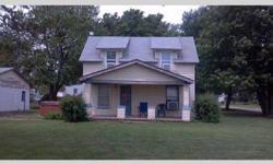 Small 2 bedroom/1bath home on large corner lot. Oversized 2 car garage. Floor furnace. Window a/c. Needs updating. Small town living with great neighbors. Sterling school district. Contact Phil