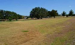 This is a beautiful 1 acre lot in exclusive upscale Bentwater on Lake Granbury Community. This lot sits nestled within some trees and slightly rolling terrain. Has a beautiful spot to build your dream home and is adjacent to homes ranging in price