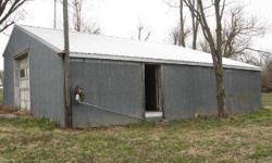 Need a little shop, with a car pit? This one has it and for not a big price. 32x40 metal building has 220, all concrete floor with car pit, garage door, and a new roof on a pretty 100x120 lot. Easement from Water Avenue. For more information, please call